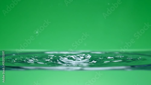 Water Droplets Splashing into Water Surface 1.