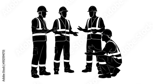 four construction workers in hard hats and safety vests conducting a safety briefing on a job site illustrating teamwork.