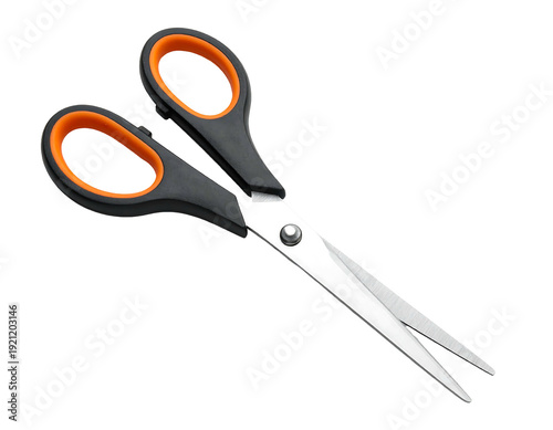 Close-up of scissors with black and orange handles.