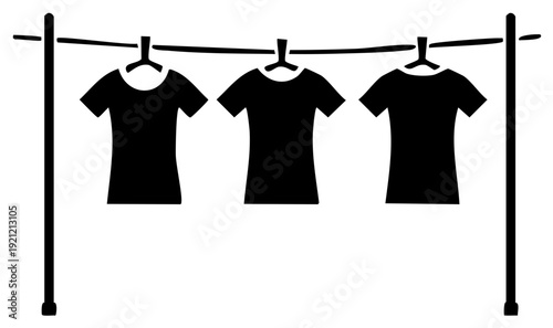 Three black T-shirts hanging on a clothesline between two poles icon