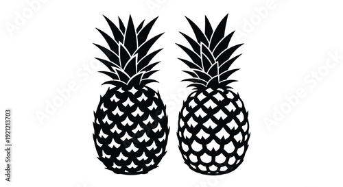 Two black silhouettes of pineapples against a white background