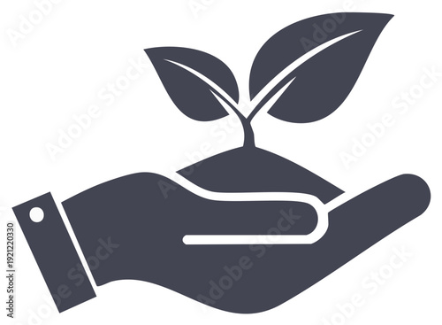 Hand holding soil and seedling representing growth and new beginnings concept