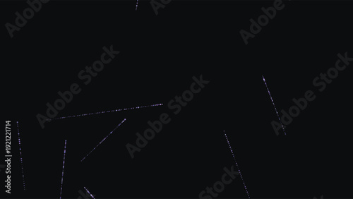 Abstract geometric light trails composition with dynamic diagonal lines against deep black background for creative graphic design