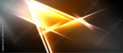 Bright abstract lines intersect, creating dynamic light effects. Golden hues dominate dark background, suggesting energy, speed.