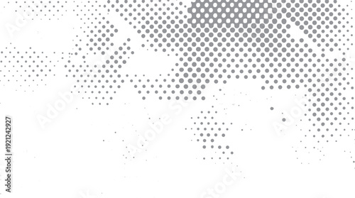 Grey circles of varying sizes scattered across a white background creating a textured pattern dots