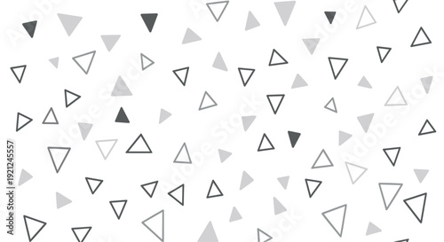 Modern abstract geometric pattern with a random arrangement of grey and black triangles on a clean white background.