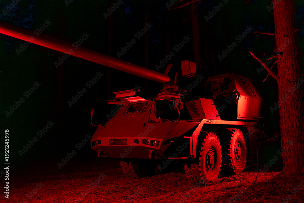Obraz premium self-propelled artillery mount Suzanne in the forest. Military vehicle at night