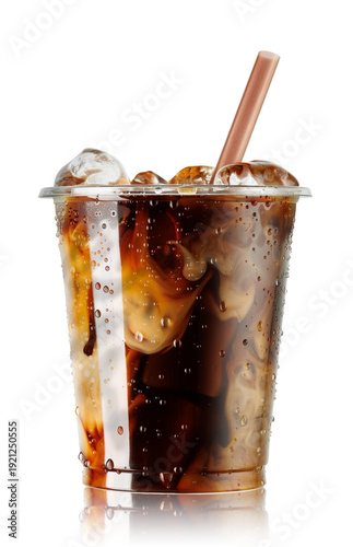 Iced coffee blended with milk in fogged disposable plastic cup isolated on white background