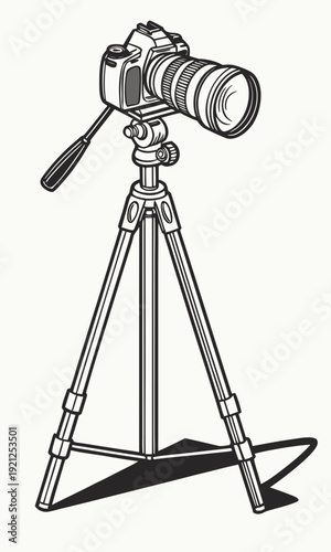 Professional DSLR Camera with Telephoto Lens on Tripod for Photography.