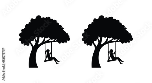 Two trees with children on swings a striking black silhouette