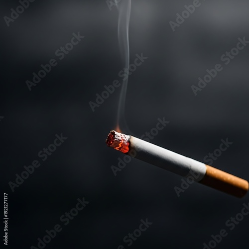 Close-up of burning cigarette smoke.