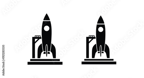 Two rocket ships stand ready for launch a striking silhouette