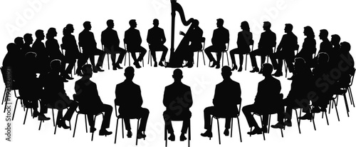 Silhouette of people sitting in a circle listening to a harpist
