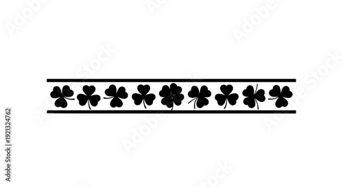 Black and white border element featuring alternating shamrocks and four-leaf clovers in a continuous design pattern on transparent background