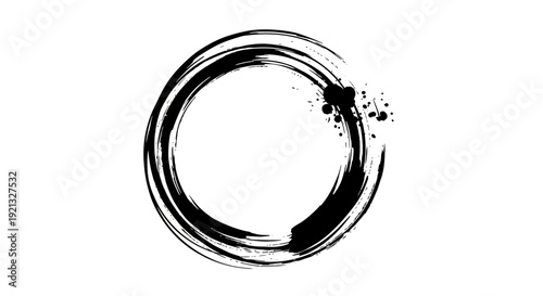 A black ink brush stroke forming an imperfect circle with a splash of ink on the right side.