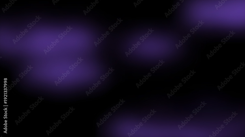 Obraz premium A blurry image with purple spots on a black background