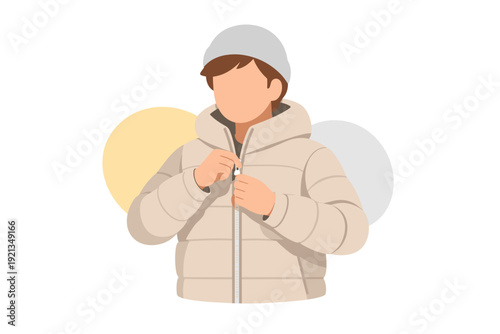 Person wearing a warm winter jacket and hat.