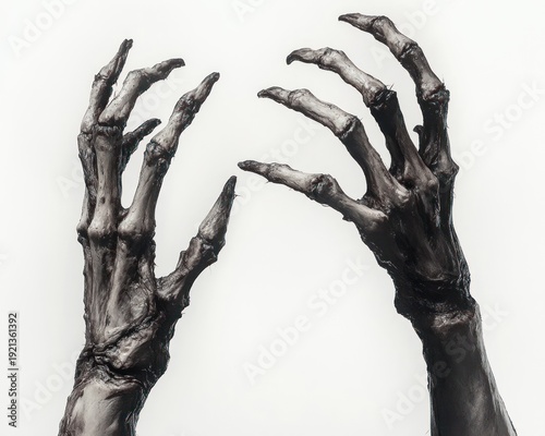 two gnarled blackened skeletal hands with elongated claw-like fingers reaching upward, eerie and haunting, conveying desperation and dread