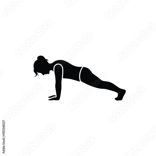Woman in dynamic push-up position with athletic physique and strength