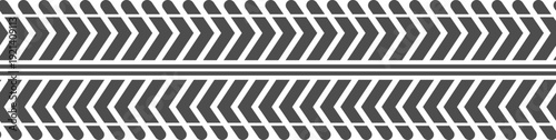 Tire track pattern showing repeating chevron treads