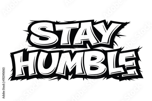 The white bold letters creatively say Stay Humble against a black and white backdrop