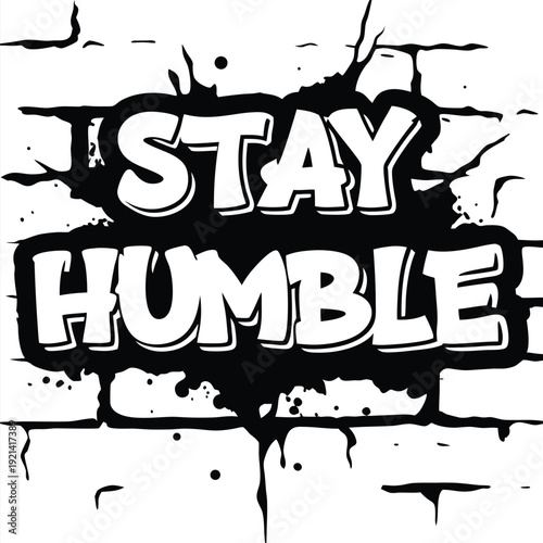 The white bold letters creatively say Stay Humble against a black and white backdrop