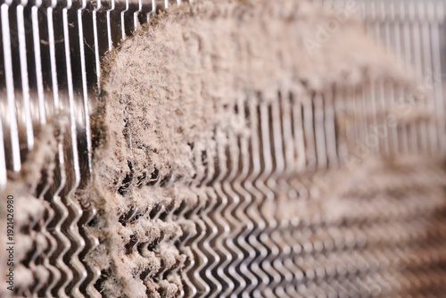 Bilde på lerret Dust buildup on metal surface of cooling device in a working environment