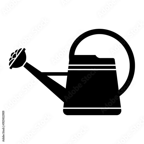 A black and white image of a watering can
