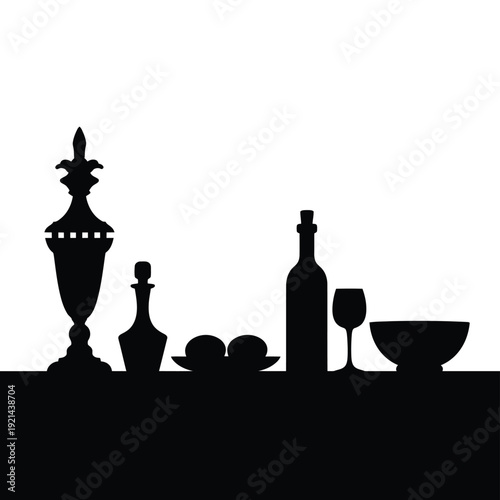 A black silhouette depicting a still life arrangement of glassware and fruit