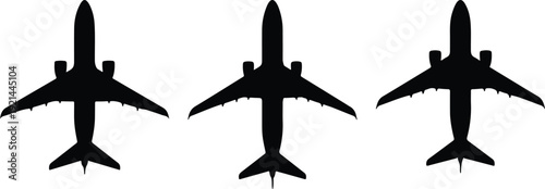 Three different views of modern commercial airplanes from a top-down perspective