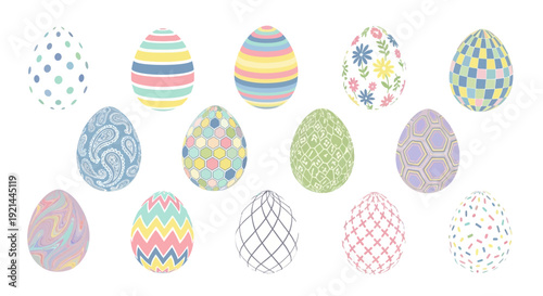 Assorted decorative eggs with various patterns and designs on a white background, viewed from directly above