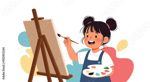 Joyful young girl with hair buns painting on a canvas using a brush and a colorful palette in a creative art studio.