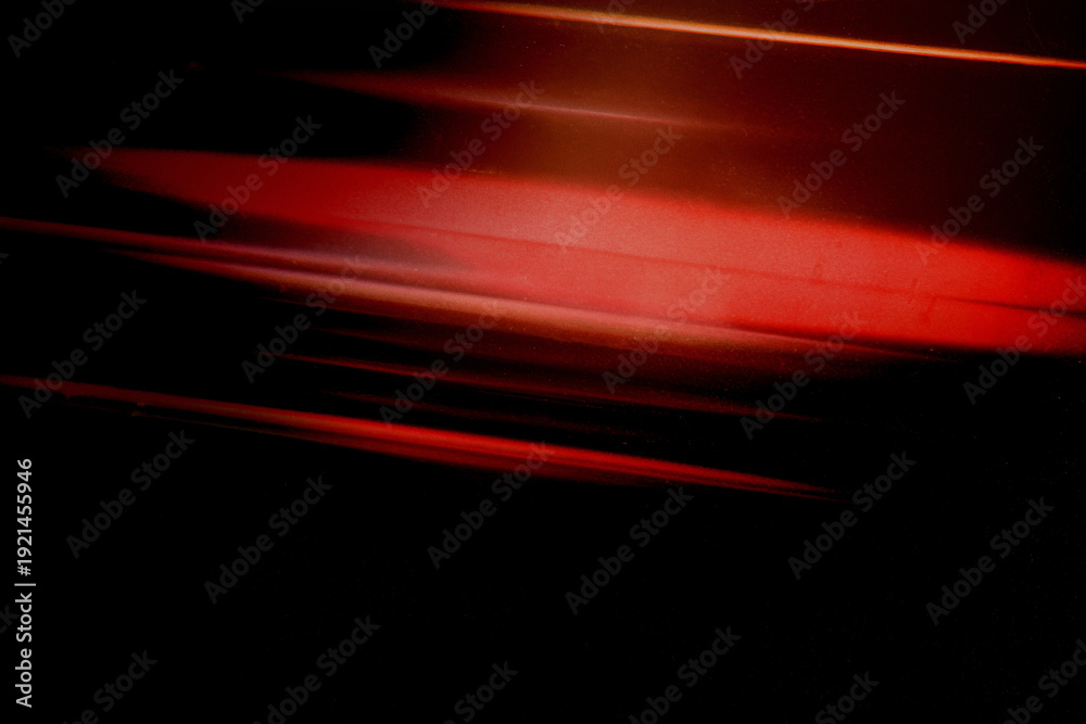 Obraz premium Texture pellicola scura con flare rosso e grana cinematografica