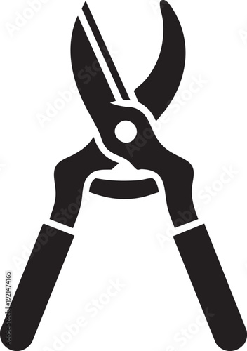 Gardening shears cutting plants in a garden from a front viewpoint