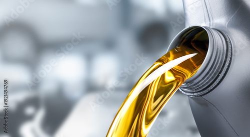 Tableau sur toile Pouring motor oil into the car engine