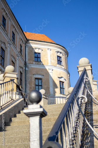 Stone staircase with iron railing leading to Mikulov Castle