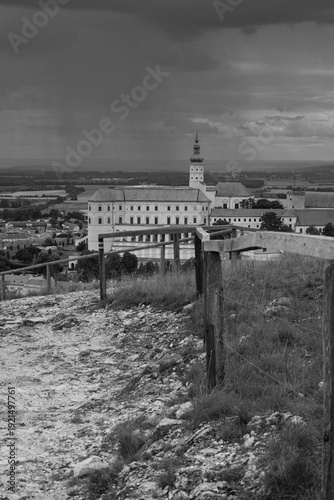 Dramatic Black and White Panorama of Mikulov Castle and Town Viewed from the Rocky Path of Holy Hill