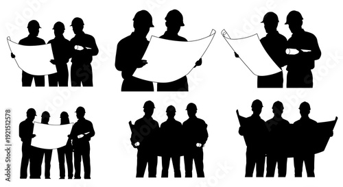 Engineers looking at blueprints