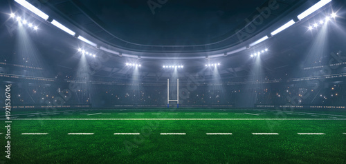 Tableau sur toile Rugby field at a sports stadium in foggy weather with shining floodlights and fans ready for an upcoming nighttime sports event