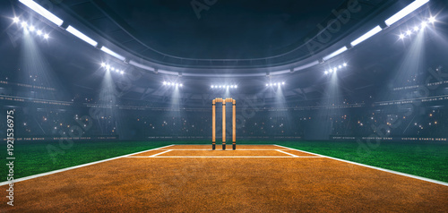 Cricket field at a sports stadium in foggy weather with shining floodlights and fans ready for an upcoming nighttime sports event.