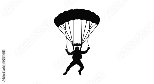 Silhouette of a skydiver descending with an open parachute above