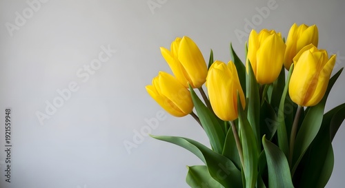 Happy mother's day bouquet of beautiful yellow tulips for mom