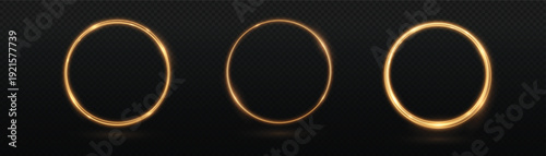 Three glowing golden rings on a black background