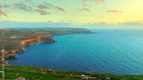 Nature landscape view of Maltese countryside, sea, sunset