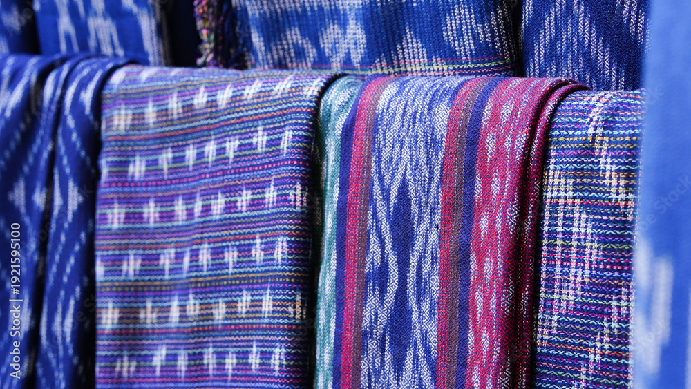 Fototapeta premium Close-up images of local fabric patterns displayed at tourist attractions in Thailand.