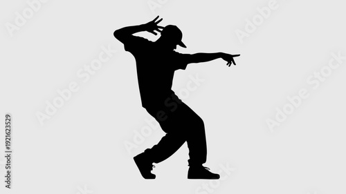 Dynamic Dance Silhouette: A captivating silhouette of a dancer is mid-motion, showcasing a vibrant display of energy and rhythm.