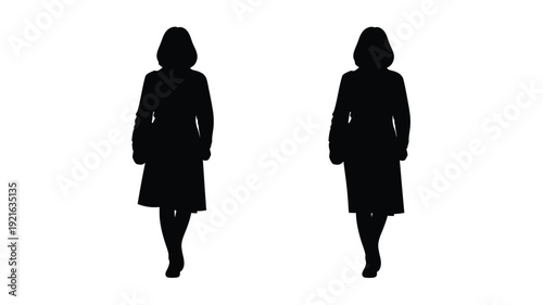 Silhouettes of two women standing facing away from the viewer