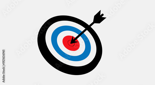 Arrow hitting bullseye on a colorful target board in bright studio background.