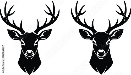 Two Black Silhouette Deer Heads With Antlers Facing Forward stag cervidae