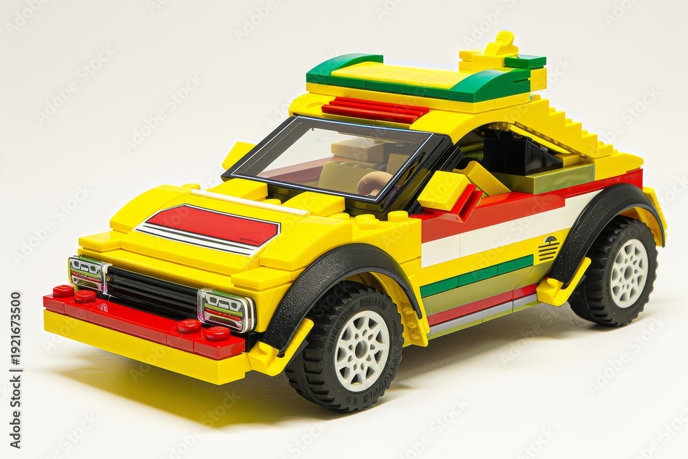 Fototapeta premium Yellow LEGO-style car with red and green accents on white background